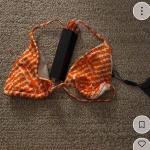 Triangl Top only 
never worn still has tags 
size small